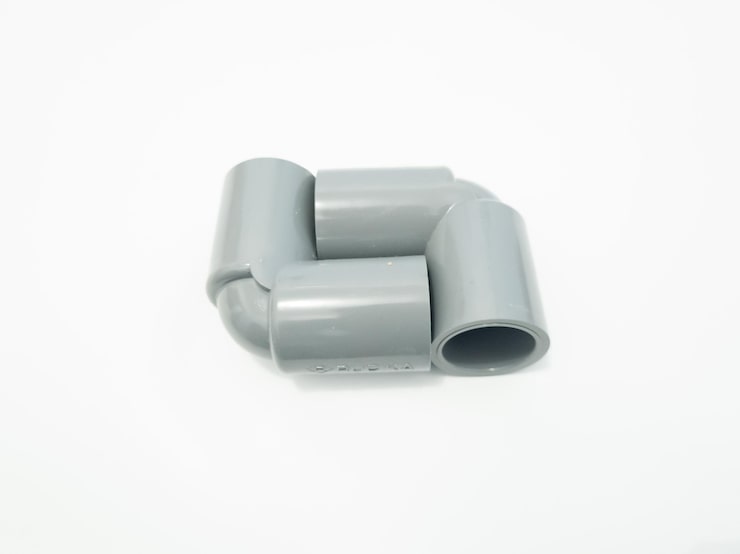 Photo plastic pipe isolated on a white background .jpeg